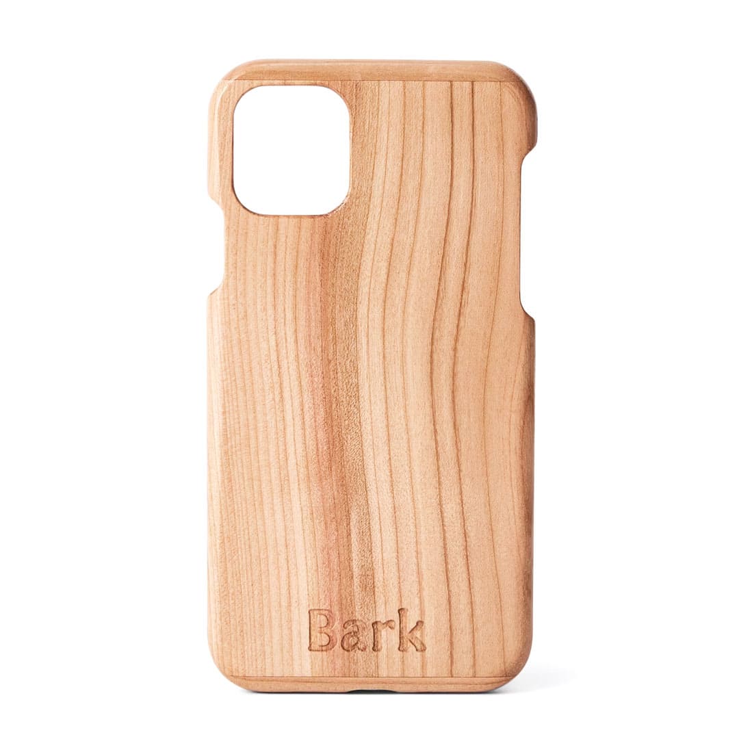 A wooden iPhone 11 case engraved with the word 