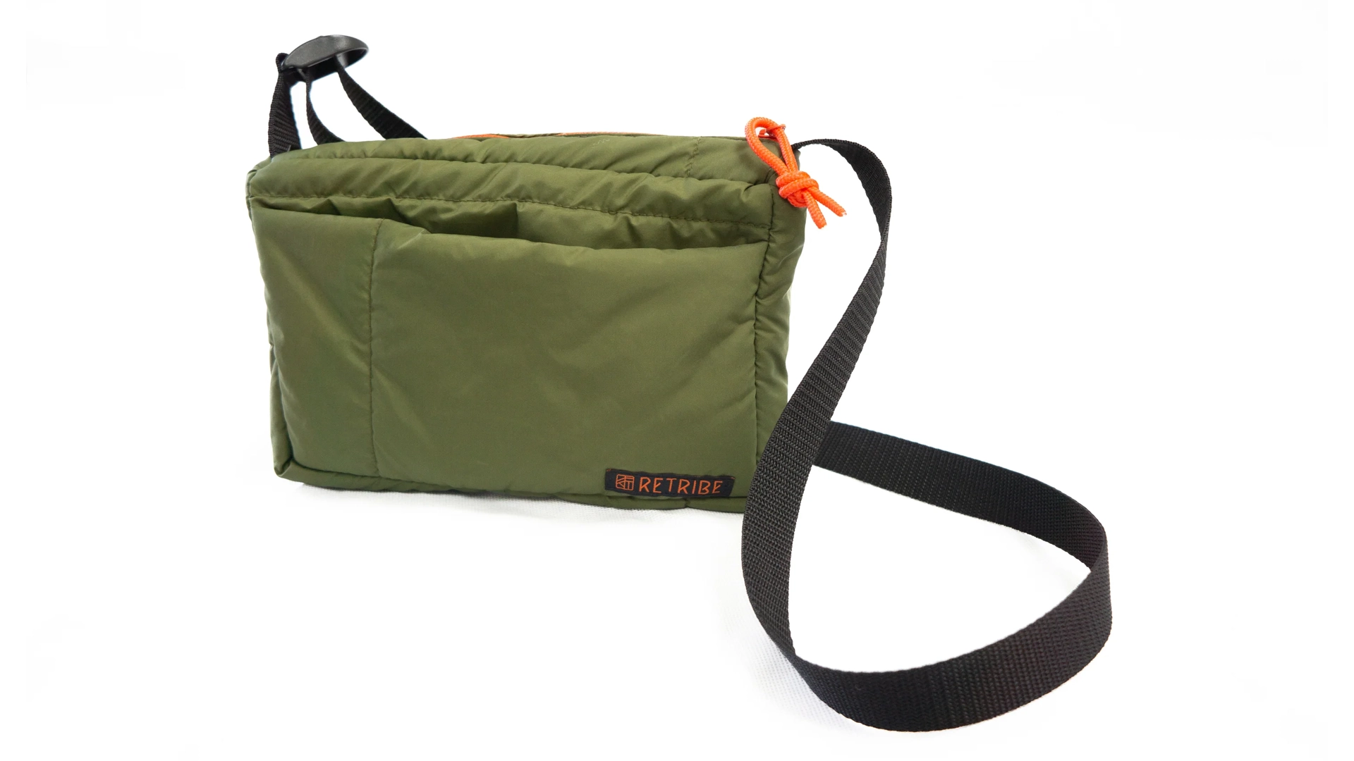 A small green bag for mobility with an orange strap.